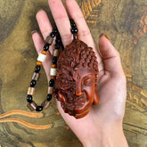 Harmony in Chaos – Hand-Carved Boxwood Palm Carving & Hanging Charm