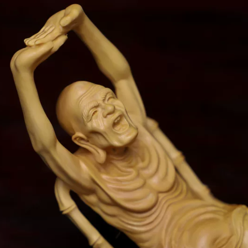 Hand-Carved Reclining Monk Sculpture – Natural Boxwood Wood Statue for Home Decor