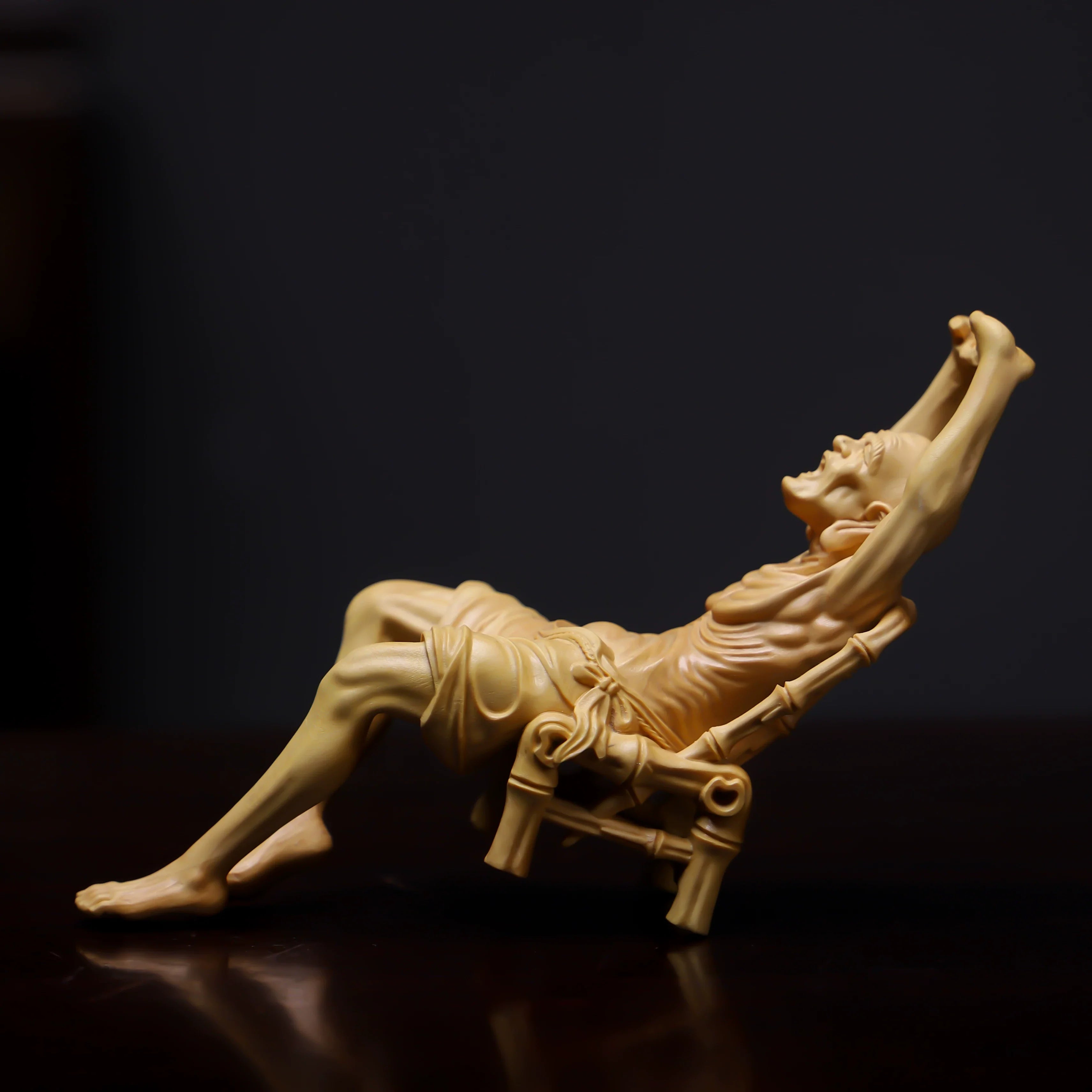 Hand-Carved Reclining Monk Sculpture – Natural Boxwood Wood Statue for Home Decor