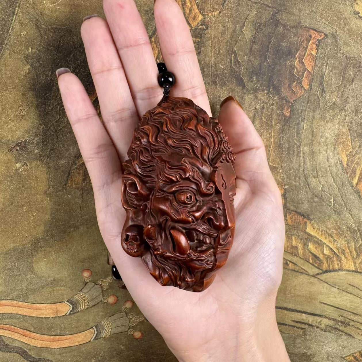Harmony in Chaos – Hand-Carved Boxwood Palm Carving & Hanging Charm
